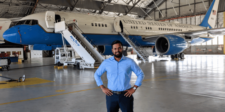 Paradyne AI Triples Sovereign On Premises AI Compute Past 15 Petaflops and Launches Self Serve AI Products for Everyone Alam Anthony Jamal standing inside an aircraft hangar in front of a United States government aircraft.